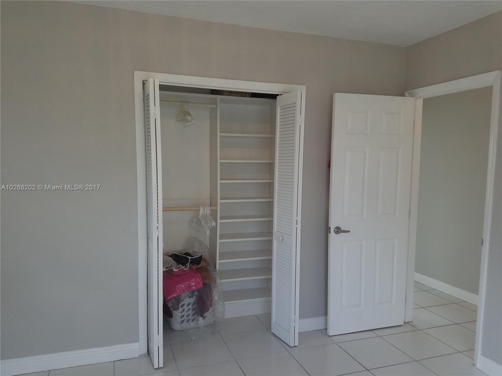 3091 Southwest 84th Court Miami, FL 33155 - Photo 21 of 24 a bathroom with a tub