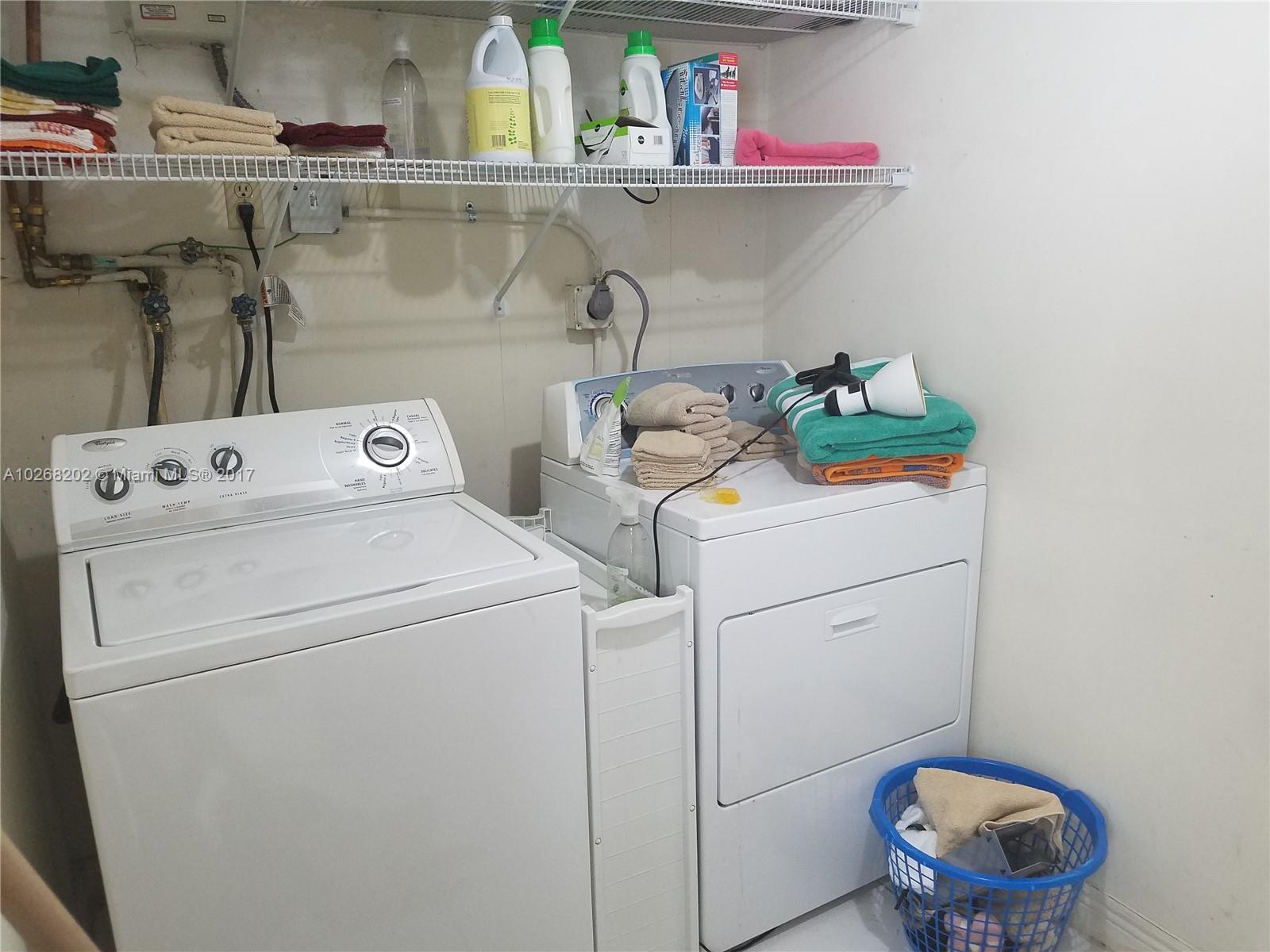 3091 Southwest 84th Court Miami, FL 33155 - Photo 22 of 24 a utility room with dryer and washer