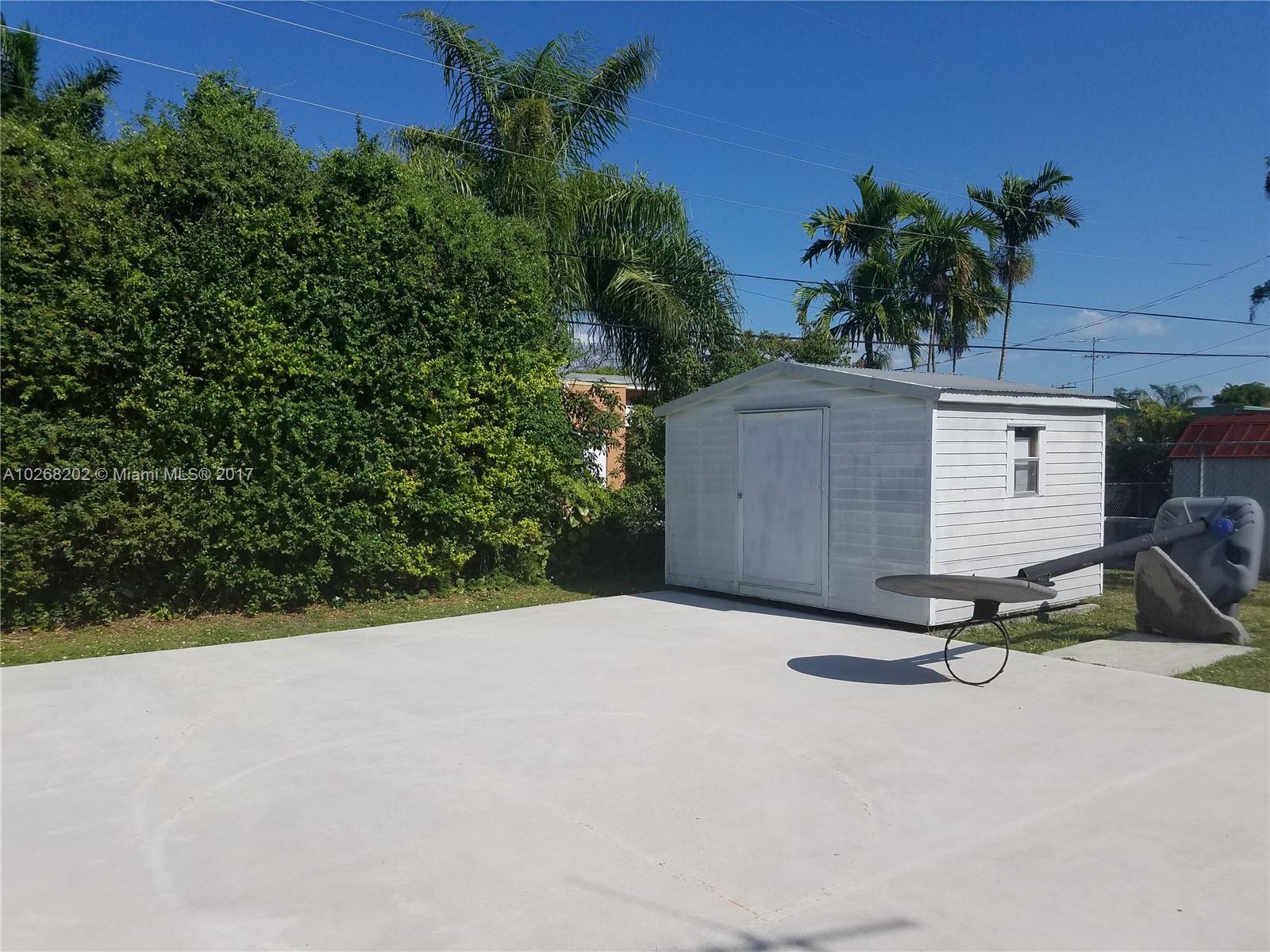 3091 Southwest 84th Court Miami, FL 33155 - Photo 23 of 24 front view of a house with a yard