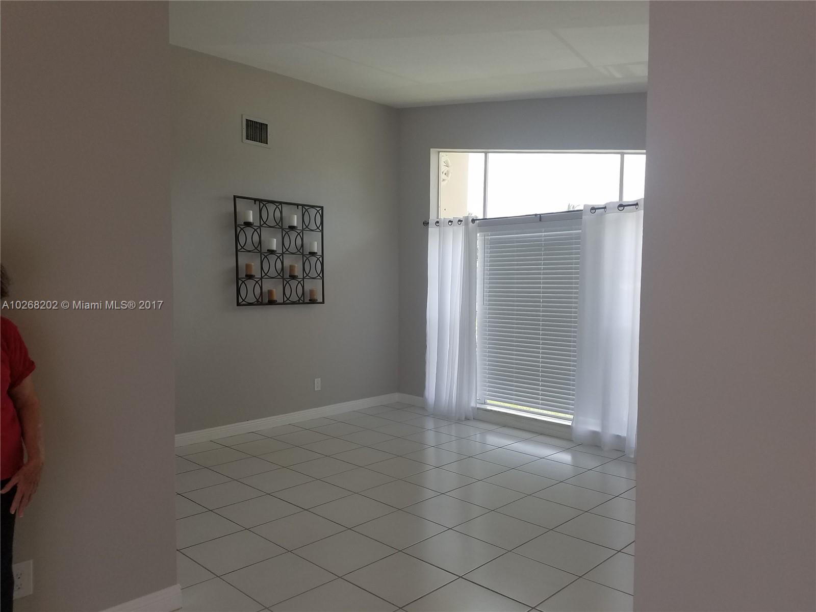 3091 Southwest 84th Court Miami, FL 33155 - Photo 7 of 24 an empty room with windows and closet