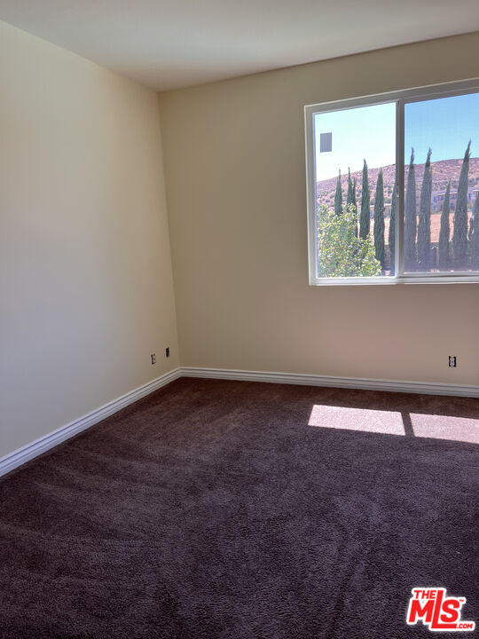 40247 Preston Road Palmdale, CA 93551 - Photo 13 of 15 a view of an empty room with a window