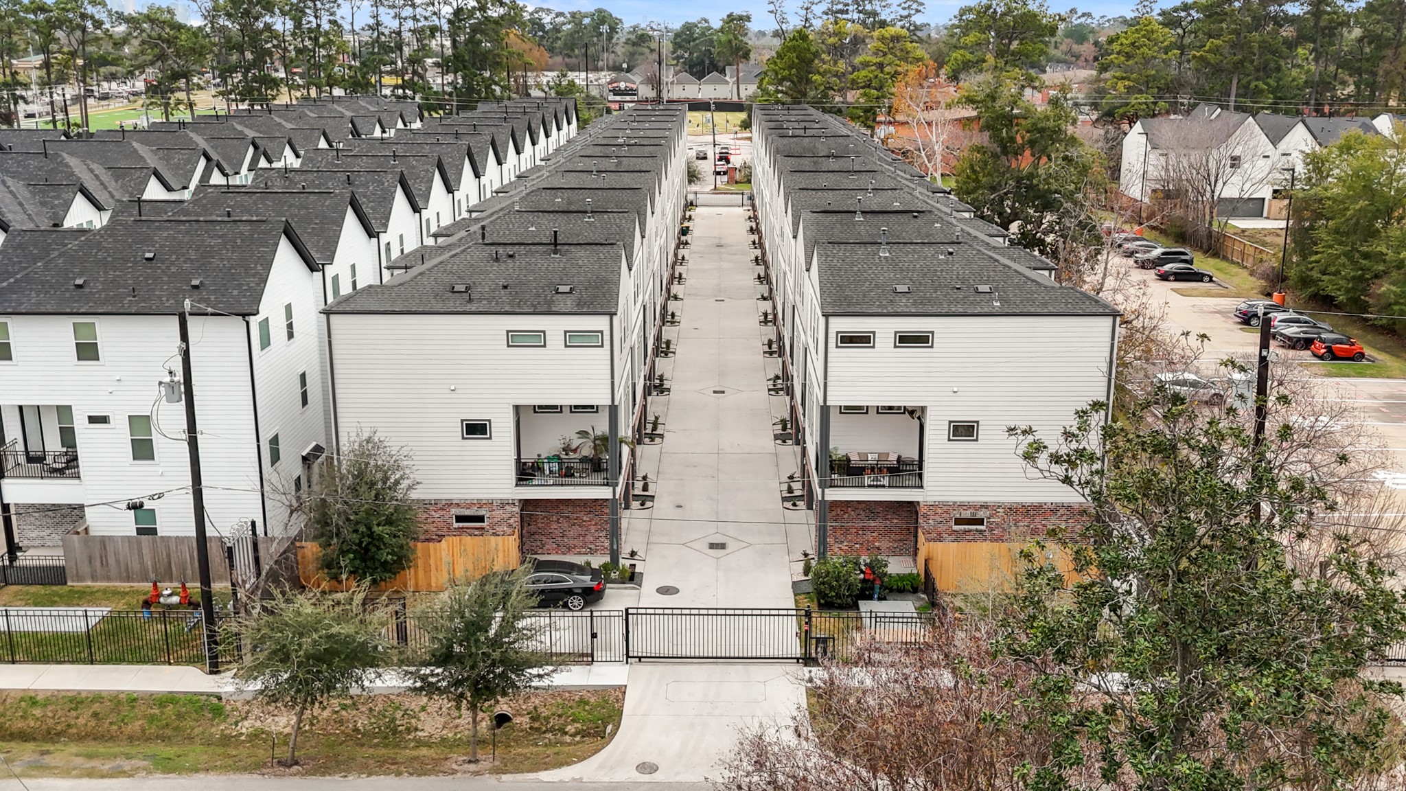 720 West Donovan Street Houston, TX 77091 - Photo 39 of 42 Enjoy a lock & leave lifestyle in the gated community of Donovan Courtyard featuring clean lines, landscaped walkways, and secured access. Well-maintained exteriors and a quiet, private setting just minutes to everything.