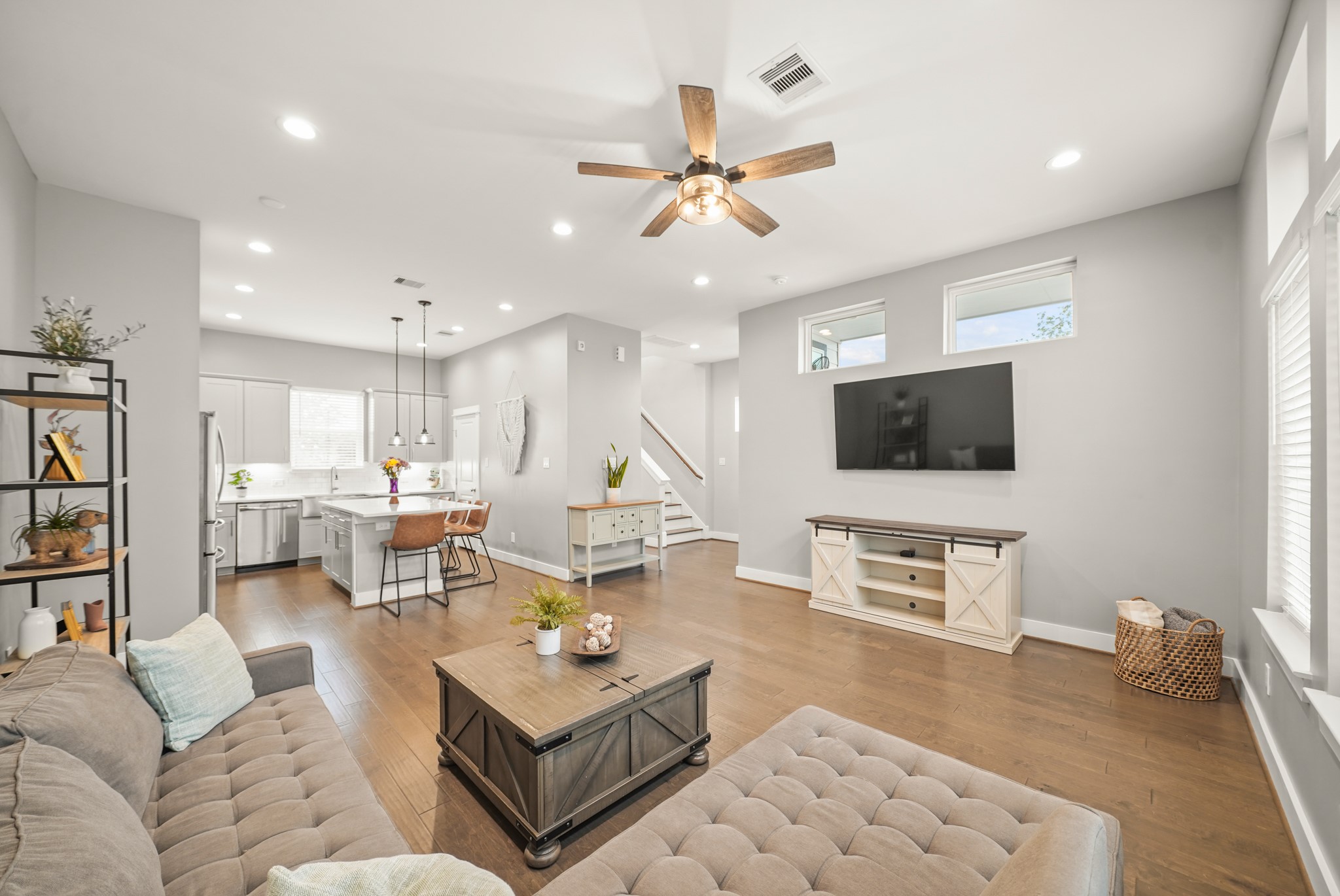 720 West Donovan Street Houston, TX 77091 - Photo 7 of 42 Perfect for entertaining family and friends, the spacious living room opens to the kitchen.