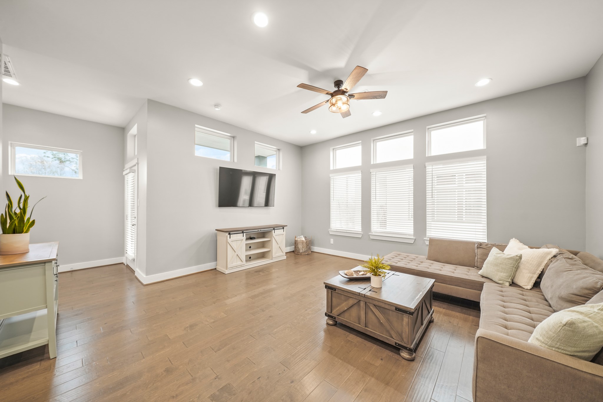 720 West Donovan Street Houston, TX 77091 - Photo 42 of 42 This open floor plan with neutral paint color selections lends itself to a variety of furniture placement & decorating theme options. The patio door on the left leads to the covered balcony and a half bath is nearby.