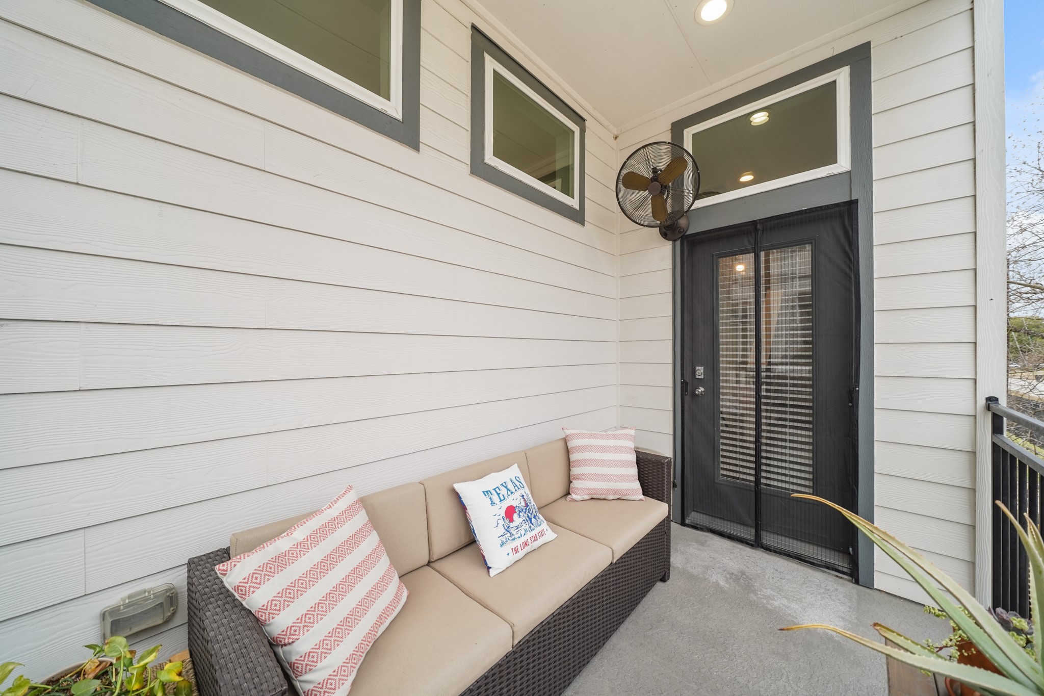 720 West Donovan Street Houston, TX 77091 - Photo 9 of 42 The 12' covered patio with recessed lighting and surrounded by wrought iron railing overlooks the front of the home and is perfect for outdoor furniture, a barbecue grill, etc. Included is an electrical outlet, water spigot and a mounted fan.