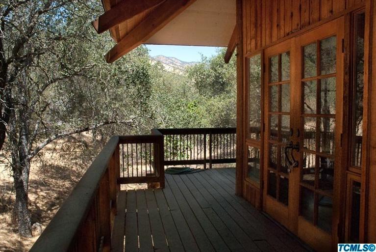 40567 Cherokee Oaks Drive Three Rivers, CA 93271 - Photo 1 of 16 a view of balcony with wooden floor
