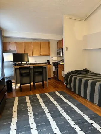 a view of a workspace with furniture