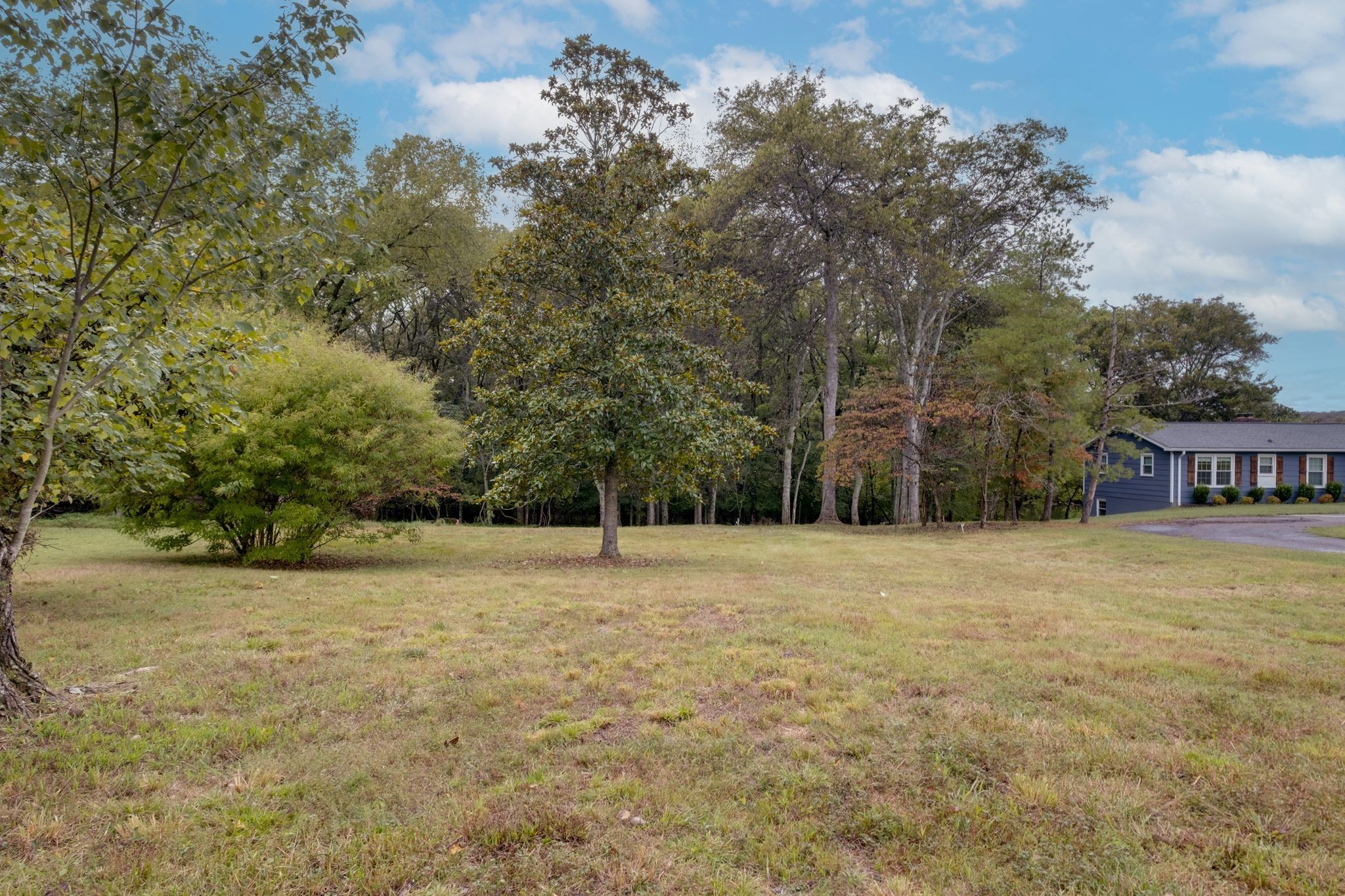 0 Pointview Circle Mount Juliet, TN 37122 - Photo 4 of 9 a house with trees in front of it