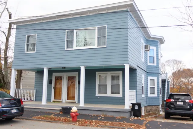 a front view of a house with a porch