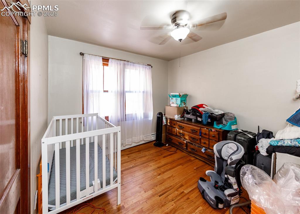 2010 East Routt Avenue Pueblo, CO 81004 - Photo 14 of 24 a bed room with furniture and a window
