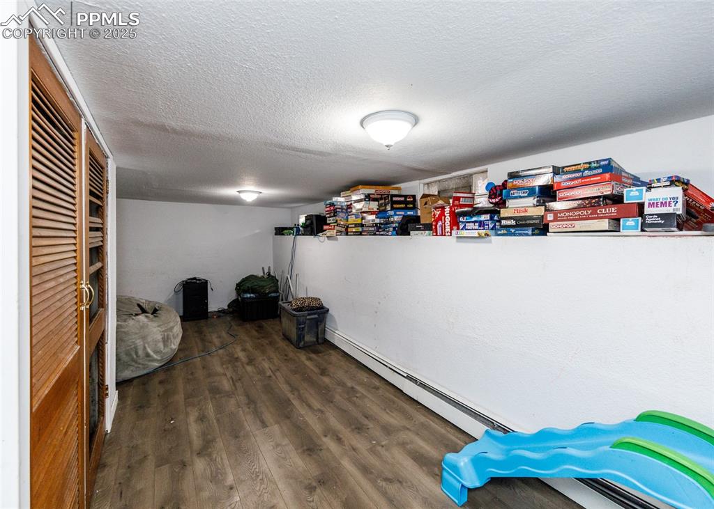 2010 East Routt Avenue Pueblo, CO 81004 - Photo 16 of 24 an empty room with furniture and a flat screen tv