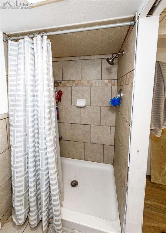 2010 East Routt Avenue Pueblo, CO 81004 - Photo 19 of 24 a bathroom with a shower and a tub