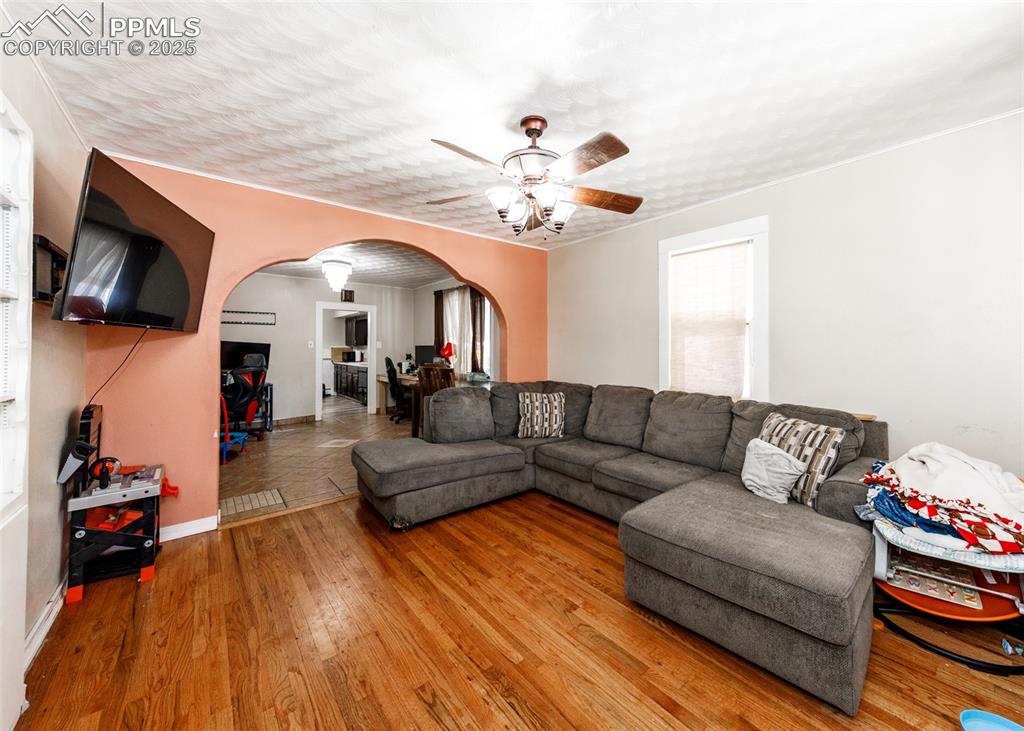 2010 East Routt Avenue Pueblo, CO 81004 - Photo 7 of 24 a living room with furniture and a flat screen tv
