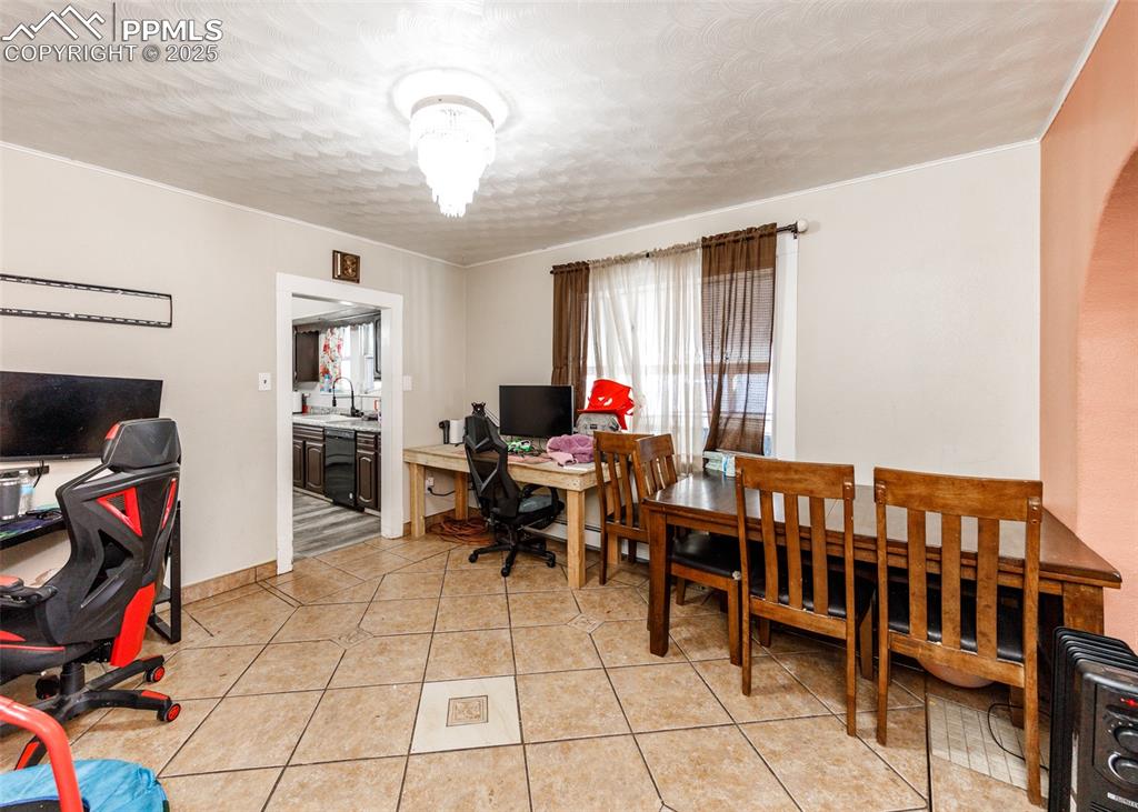 2010 East Routt Avenue Pueblo, CO 81004 - Photo 10 of 24 a living room with furniture and a flat screen tv