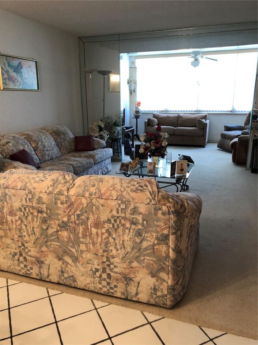 Royal Oaks Miami, FL 33179 - Photo 11 of 18 a living room with furniture