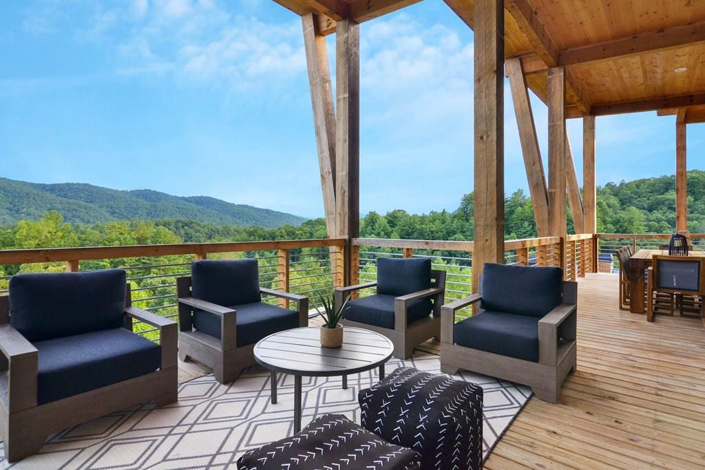 45 Eagle Watch Court Blue Ridge, GA 30513 - Photo 1 of 58 a balcony with furniture and a garden