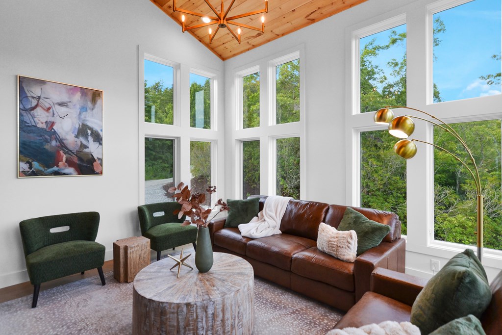 45 Eagle Watch Court Blue Ridge, GA 30513 - Photo 11 of 58 a living room with furniture and a large window