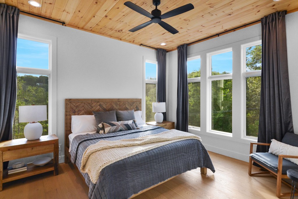 45 Eagle Watch Court Blue Ridge, GA 30513 - Photo 21 of 58 a bedroom with a large bed and windows