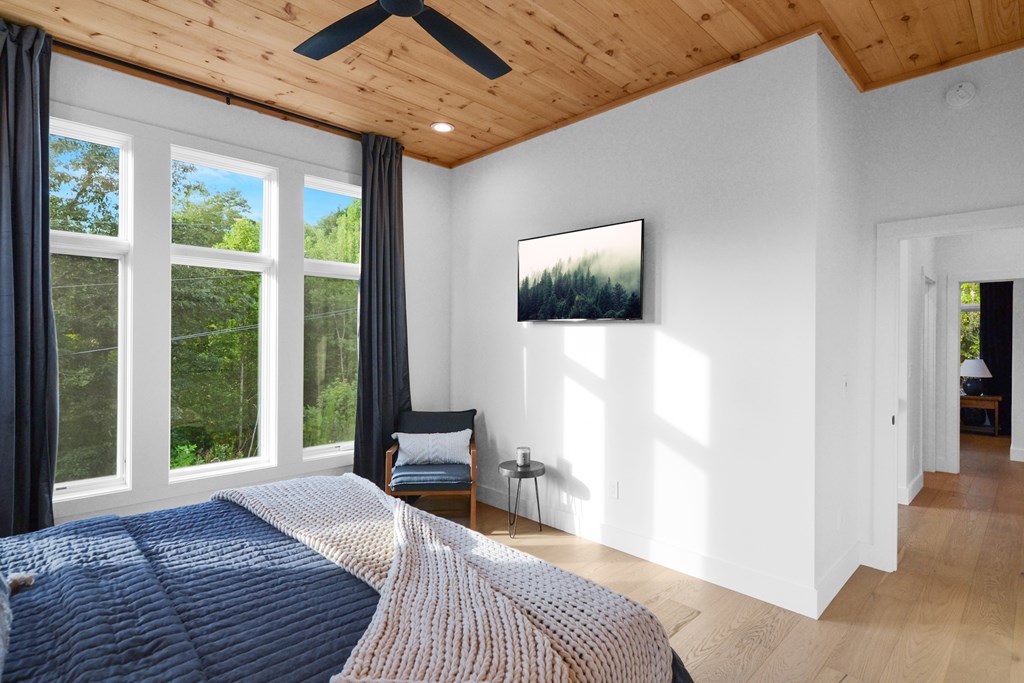 45 Eagle Watch Court Blue Ridge, GA 30513 - Photo 22 of 58 a bedroom with a bed and a flat screen tv