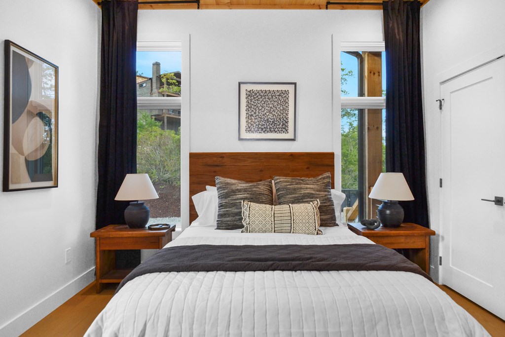 45 Eagle Watch Court Blue Ridge, GA 30513 - Photo 29 of 58 a bedroom with a bed and wooden floor