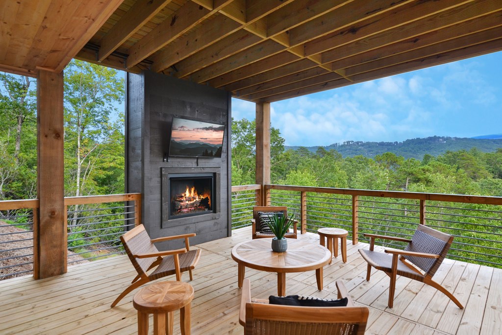 45 Eagle Watch Court Blue Ridge, GA 30513 - Photo 40 of 58 a view of a patio with a table and chairs