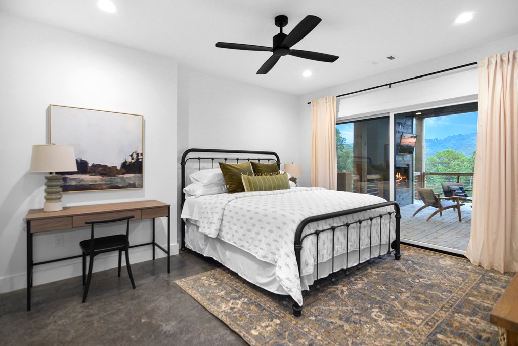 45 Eagle Watch Court Blue Ridge, GA 30513 - Photo 44 of 58 a bedroom with a large bed and a window