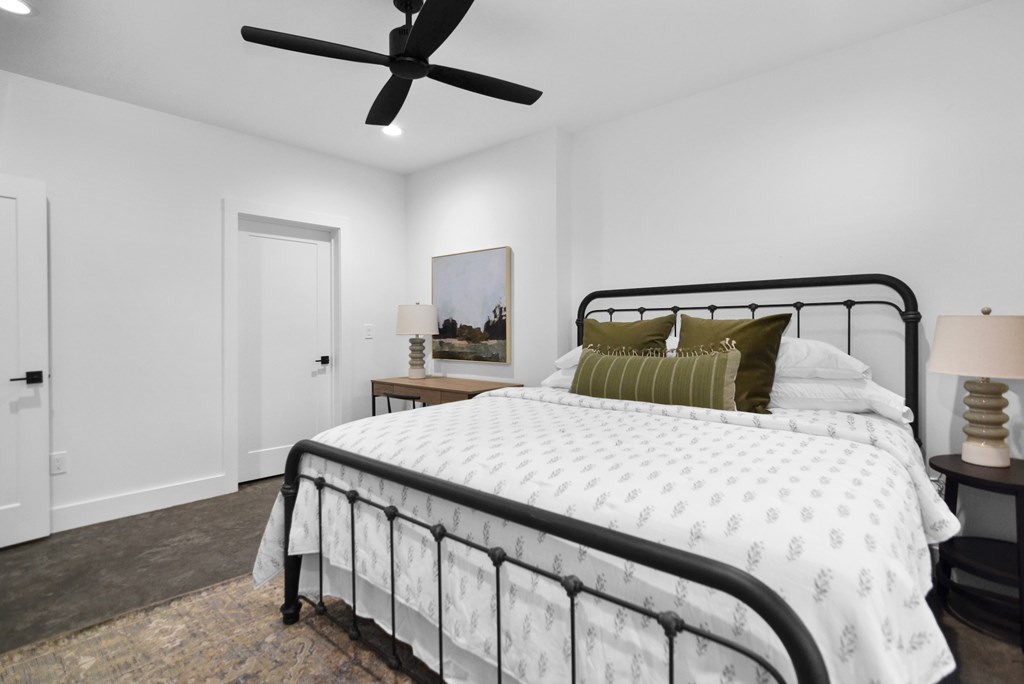 45 Eagle Watch Court Blue Ridge, GA 30513 - Photo 46 of 58 a bedroom with a bed and a mirror