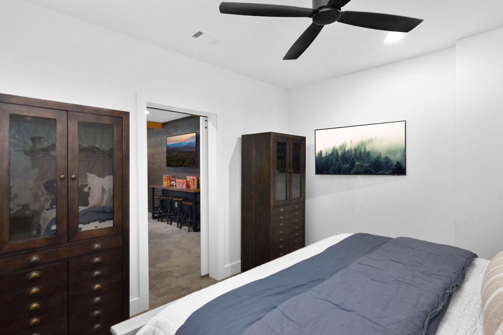 45 Eagle Watch Court Blue Ridge, GA 30513 - Photo 50 of 58 a bedroom with a bed and a view of kitchen