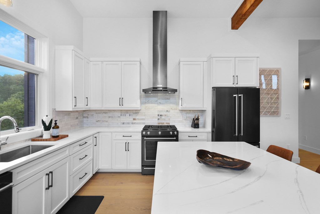 45 Eagle Watch Court Blue Ridge, GA 30513 - Photo 6 of 58 a kitchen with a sink stove and refrigerator