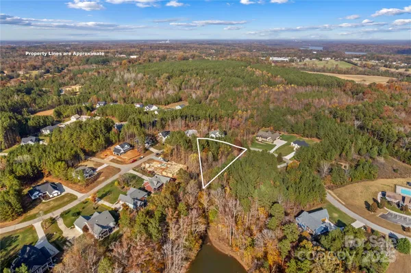 an aerial view of residential house with parking space