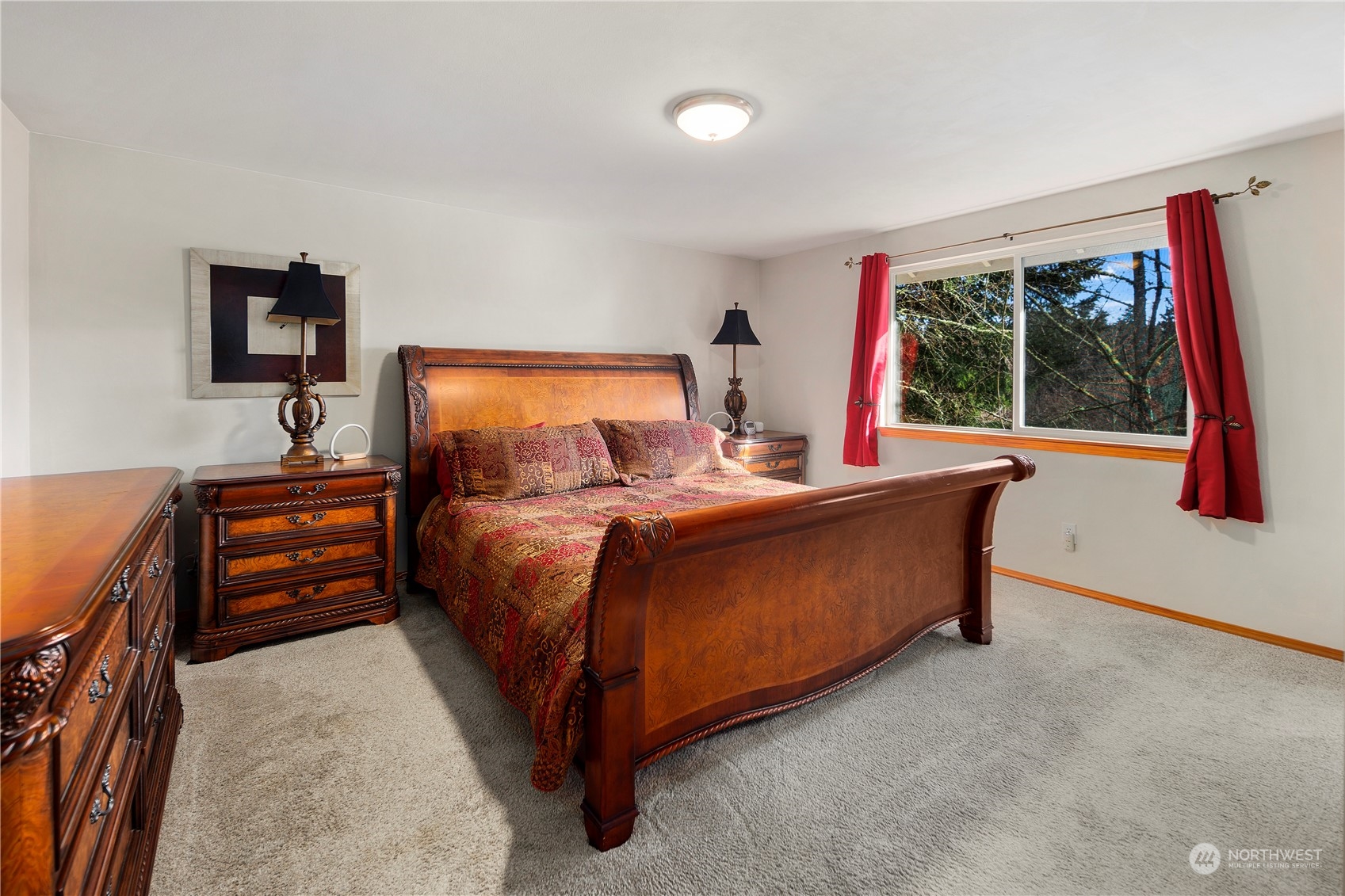 17005 51st Avenue Southeast Bothell, WA 98012 - Photo 15 of 40 a bed room with a bed and a large window