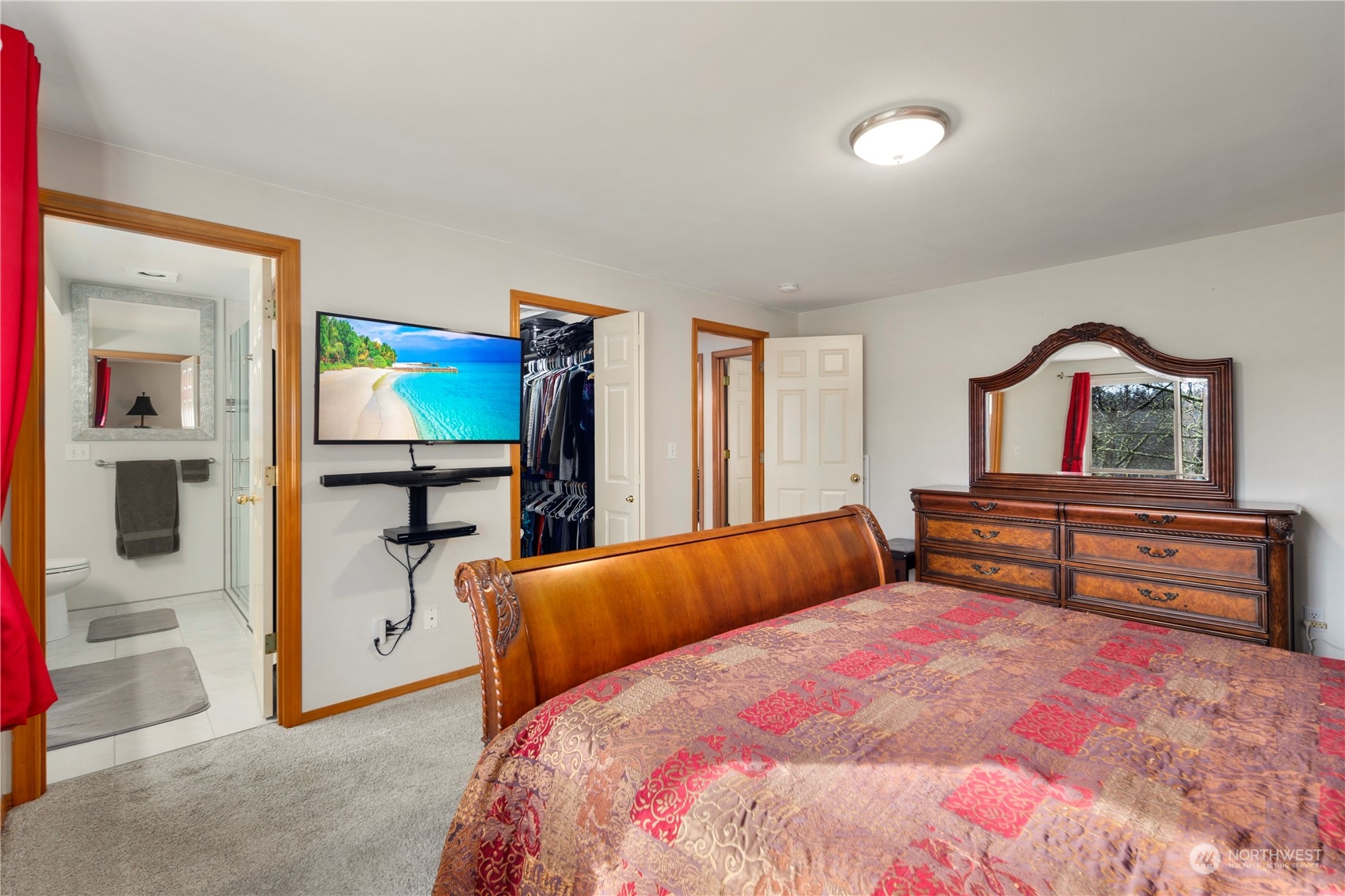 17005 51st Avenue Southeast Bothell, WA 98012 - Photo 16 of 40 a bedroom with furniture and a flat screen tv