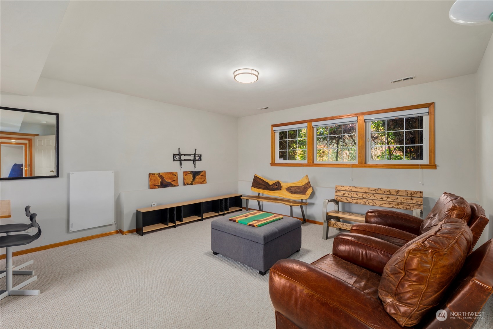 17005 51st Avenue Southeast Bothell, WA 98012 - Photo 22 of 40 a living room with furniture and a window