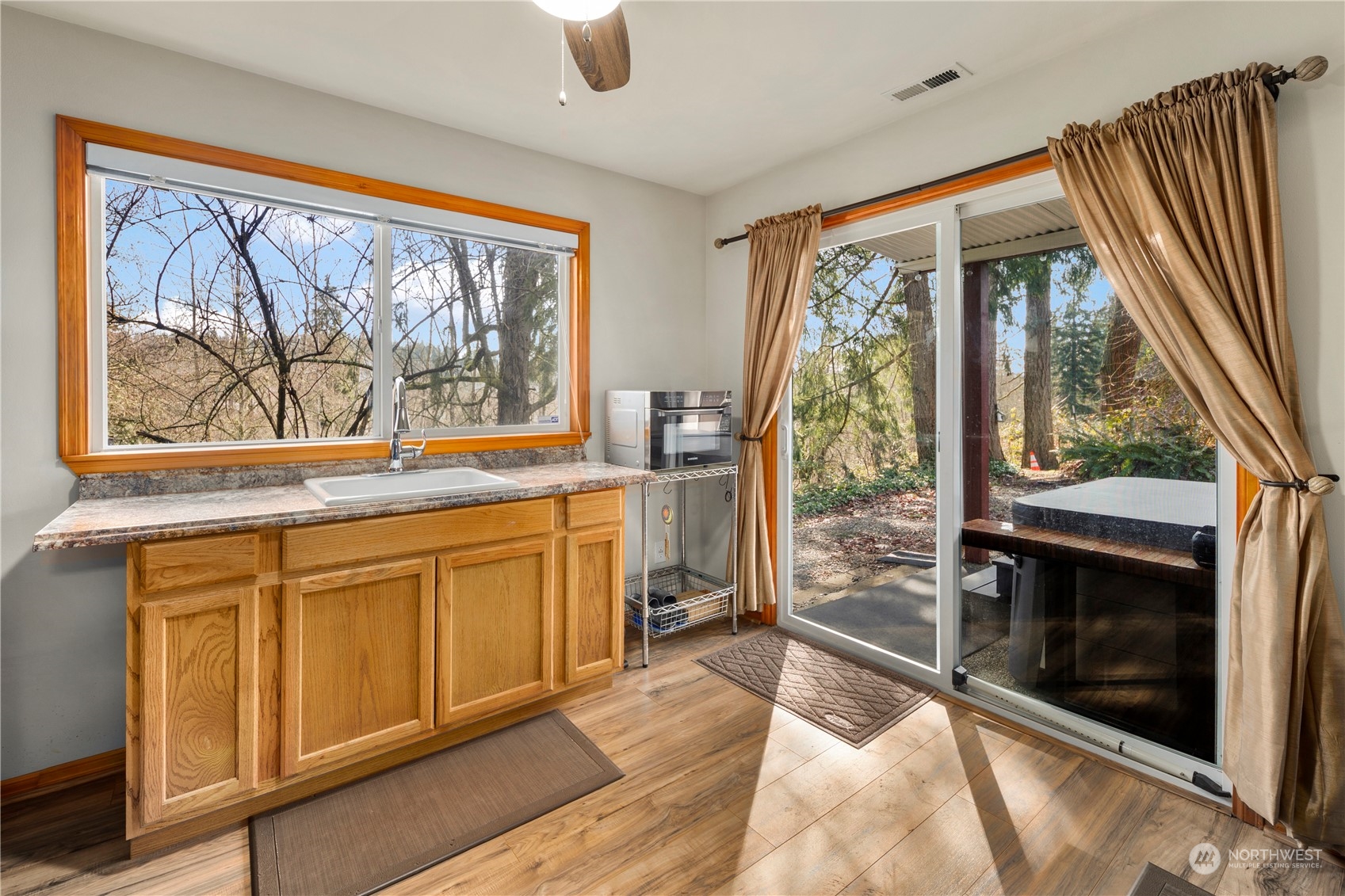 17005 51st Avenue Southeast Bothell, WA 98012 - Photo 27 of 40 a kitchen with stainless steel appliances a stove top oven