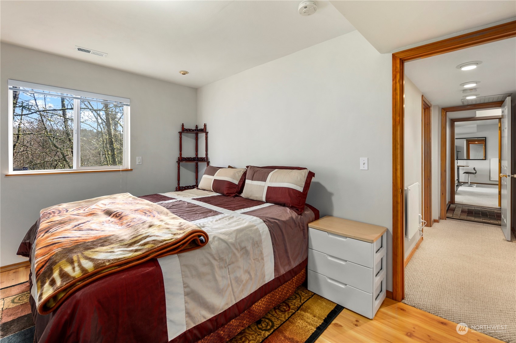 17005 51st Avenue Southeast Bothell, WA 98012 - Photo 31 of 40 a bedroom with a bed and a window