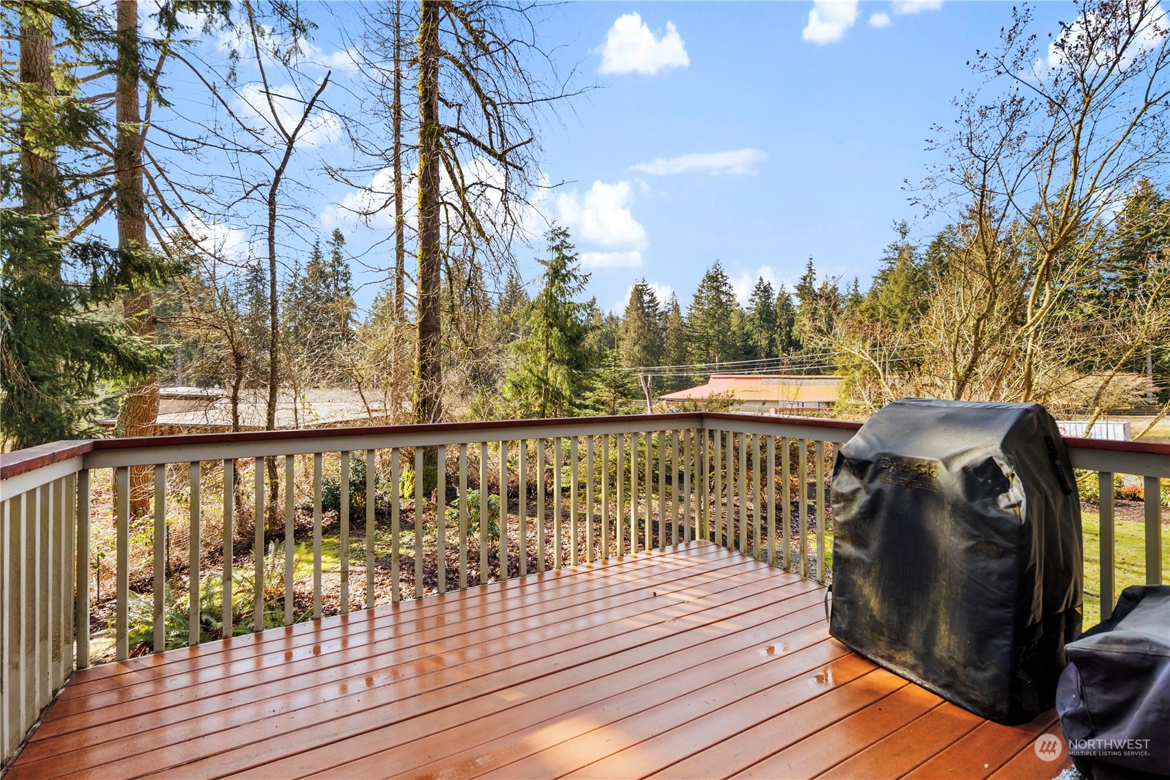 17005 51st Avenue Southeast Bothell, WA 98012 - Photo 34 of 40 a view of a balcony with wooden floor and fence