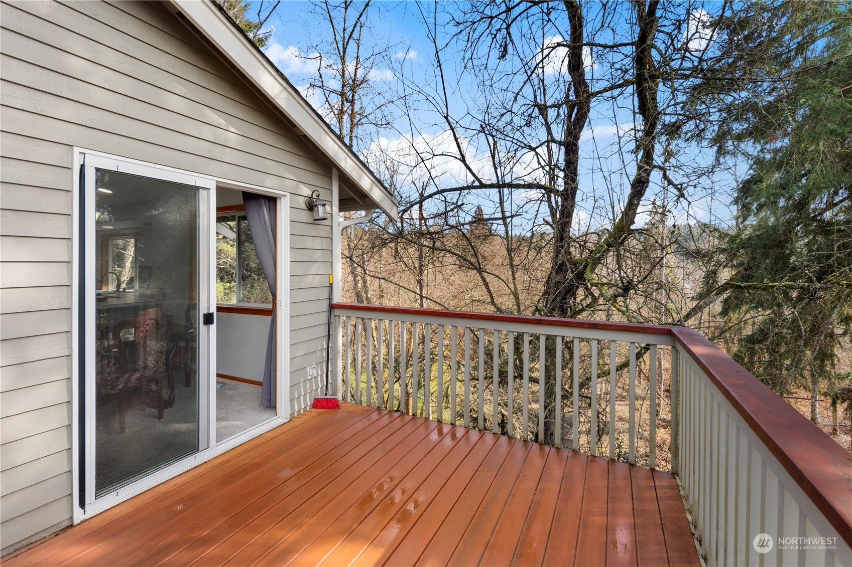 17005 51st Avenue Southeast Bothell, WA 98012 - Photo 35 of 40 a view of balcony with wooden floor and fence
