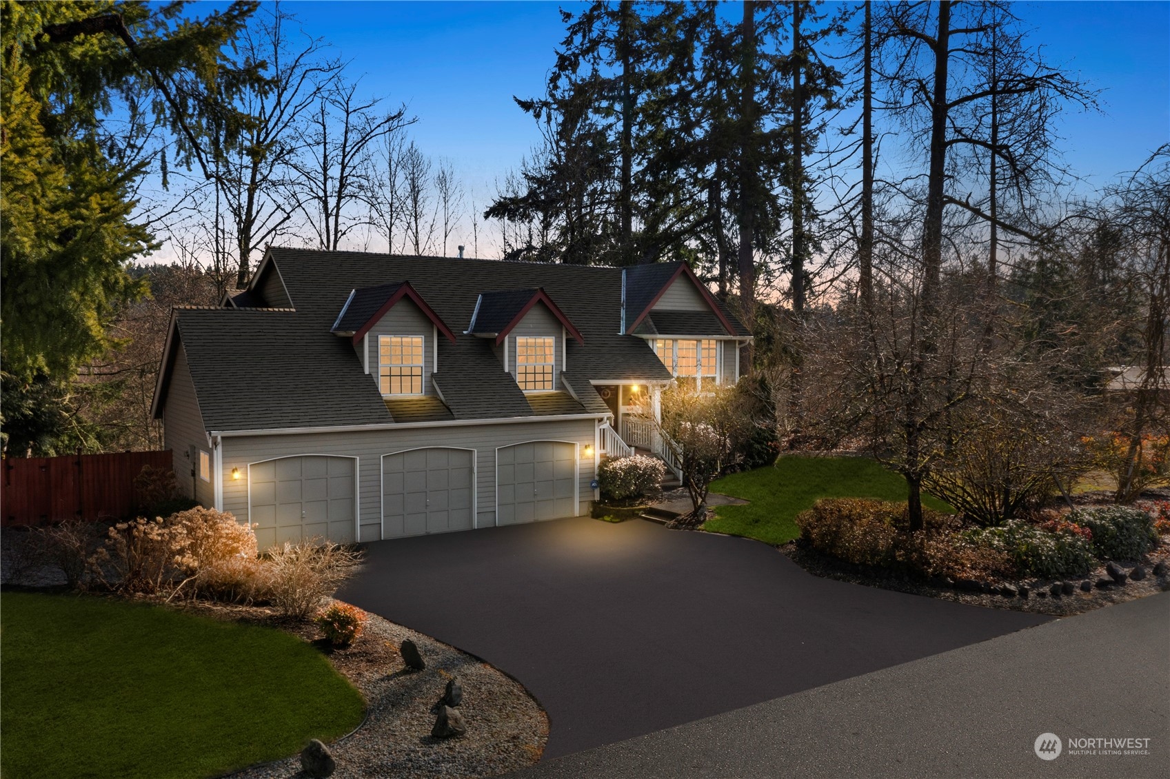 17005 51st Avenue Southeast Bothell, WA 98012 - Photo 40 of 40 a front view of a house with garden