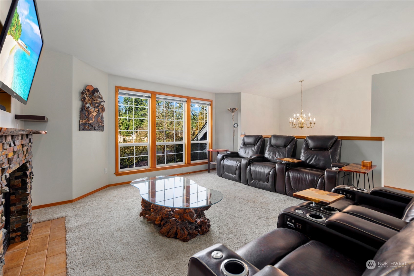 17005 51st Avenue Southeast Bothell, WA 98012 - Photo 4 of 40 a living room with furniture and a flat screen tv