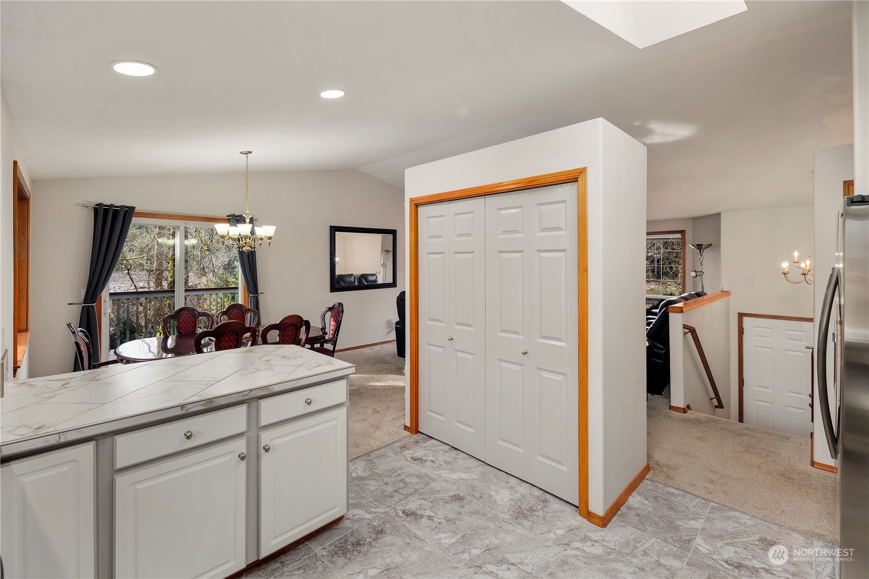 17005 51st Avenue Southeast Bothell, WA 98012 - Photo 9 of 40 a kitchen with a sink and a refrigerator