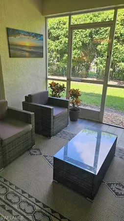 a room with furniture and a window