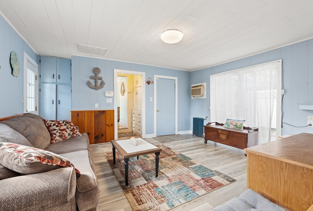278 A Delano Road Marion, MA 02738 - Photo 13 of 32 a living room with furniture and wooden floor