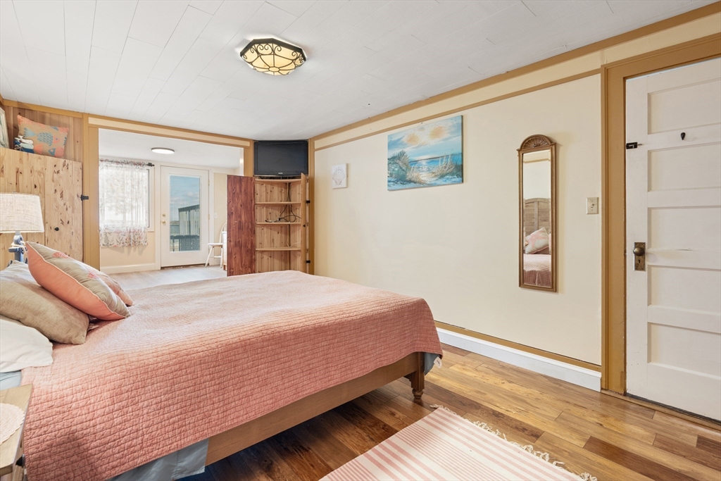 278 A Delano Road Marion, MA 02738 - Photo 15 of 32 a bedroom with a bed and a window