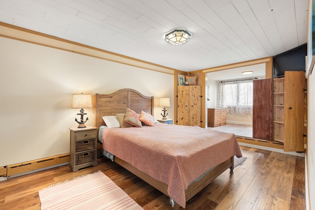 278 A Delano Road Marion, MA 02738 - Photo 16 of 32 a bedroom with a bed and a window