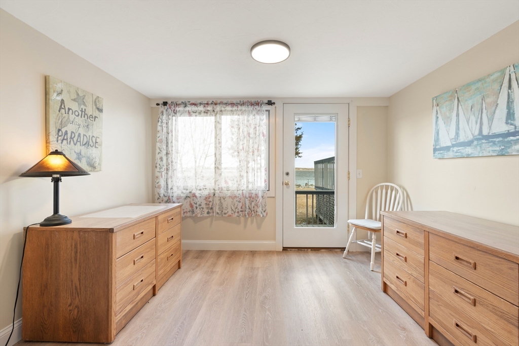 278 A Delano Road Marion, MA 02738 - Photo 18 of 32 a kitchen with stainless steel appliances wooden floor and a window