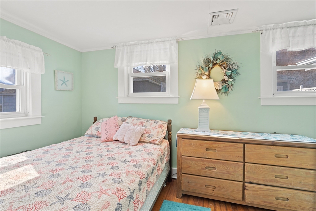 278 A Delano Road Marion, MA 02738 - Photo 19 of 32 a bedroom with a bed and a window