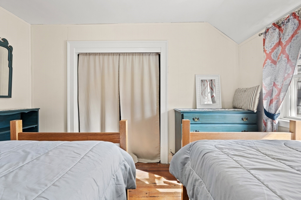 278 A Delano Road Marion, MA 02738 - Photo 22 of 32 a bedroom with a bed and a window