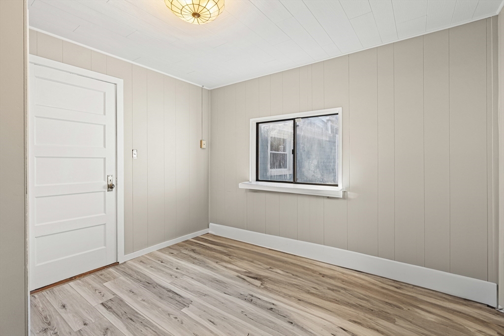 278 A Delano Road Marion, MA 02738 - Photo 23 of 32 a view of empty room with wooden floor and fan