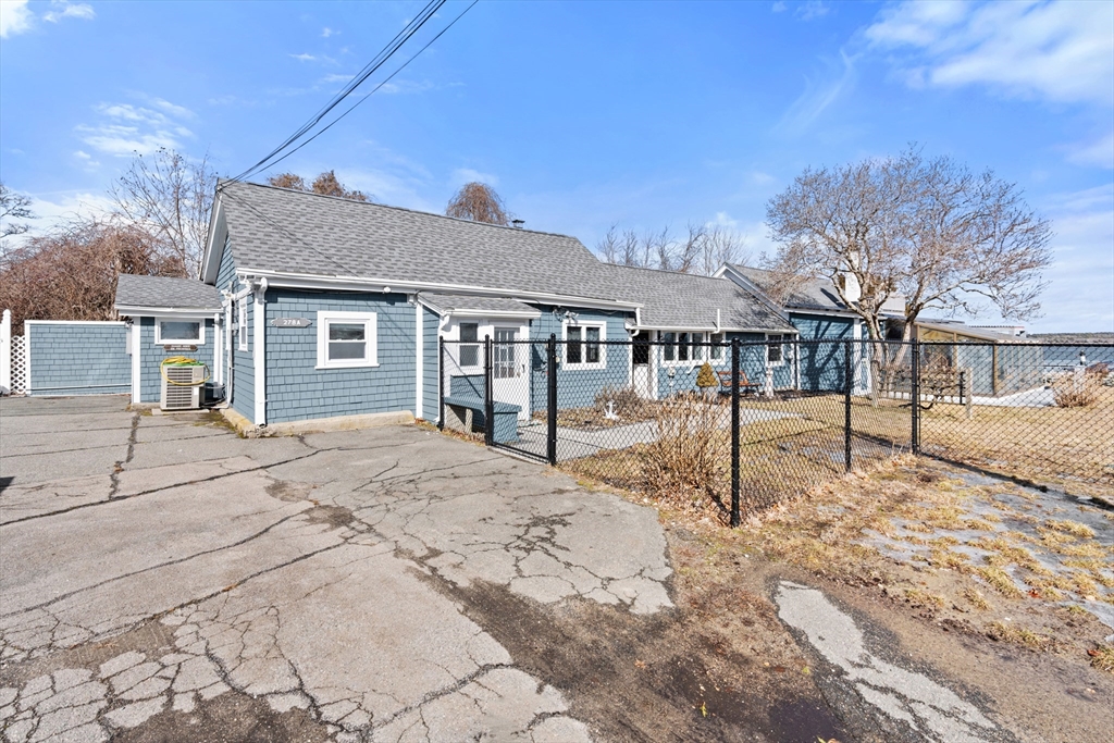 278 A Delano Road Marion, MA 02738 - Photo 5 of 32 a view of a house with a snow on the road