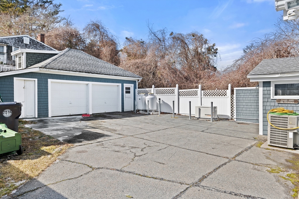 278 A Delano Road Marion, MA 02738 - Photo 6 of 32 a view of garage yard and tree